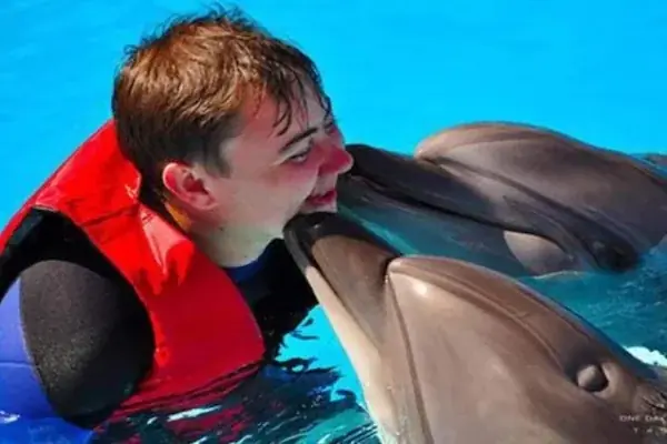 Family Swimming with Dolphins in Hurghada